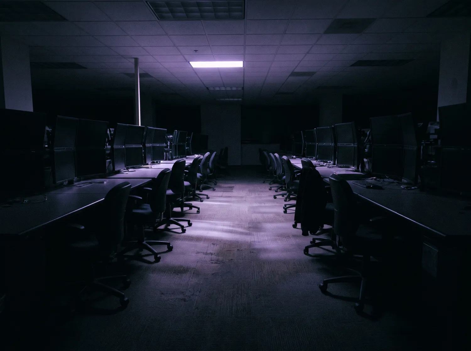 A deserted institutional trading floor after hours
