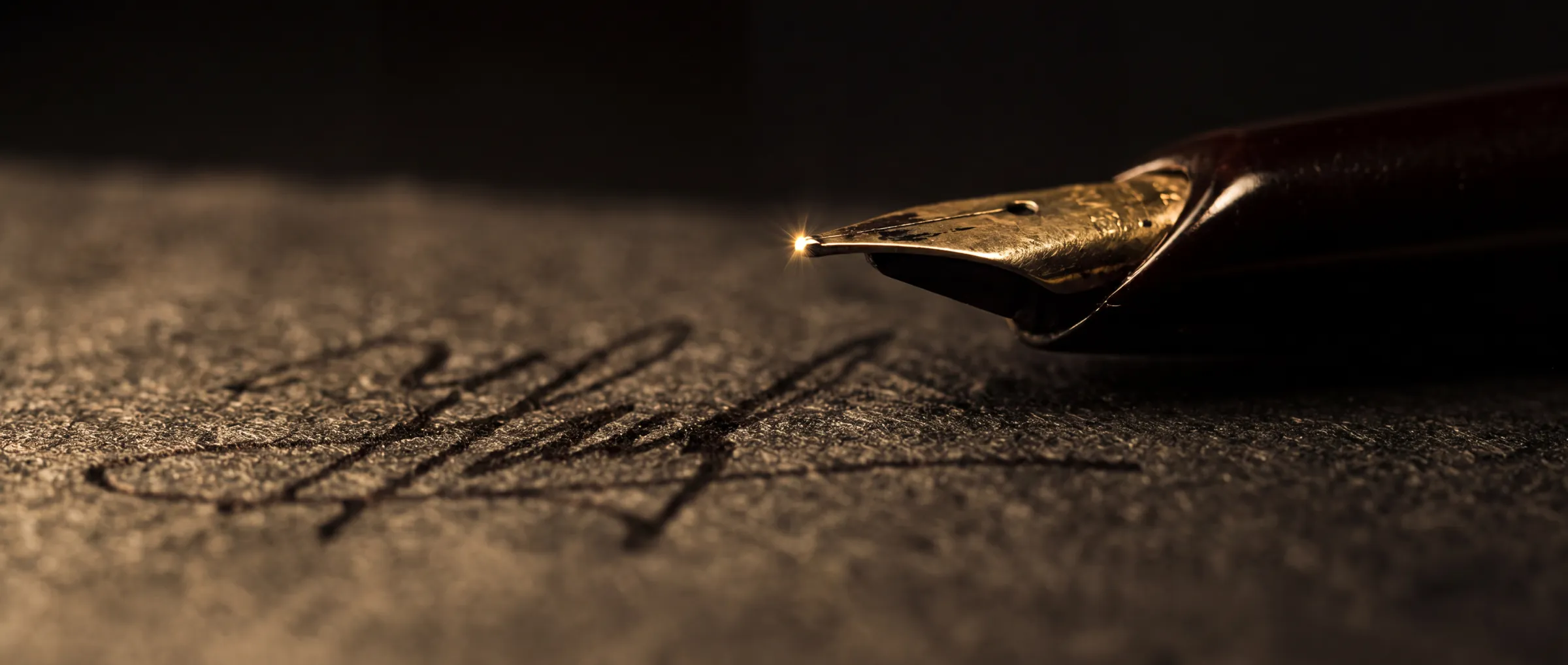 A fountain pen resting across an executed signature block